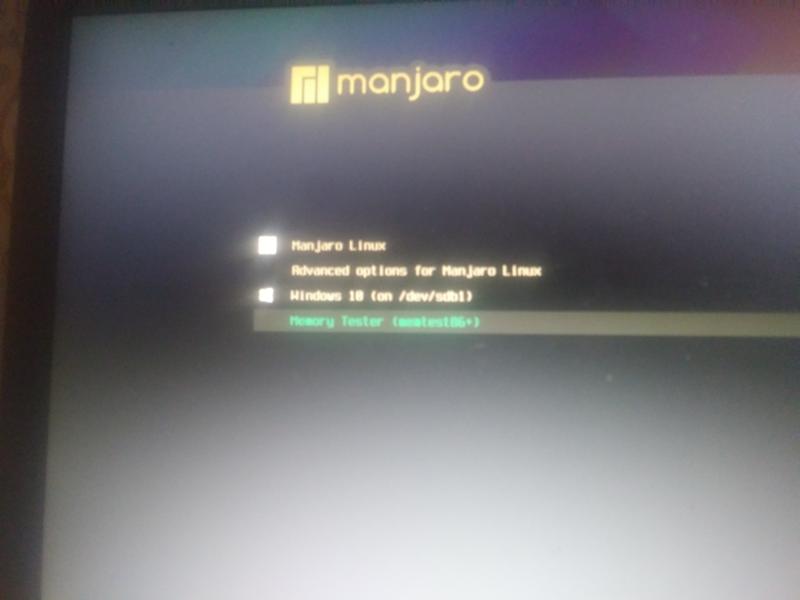После установки linux manjaro решил вернуться на винду, но при попытке загрузится с флешки появляется окно manjaro